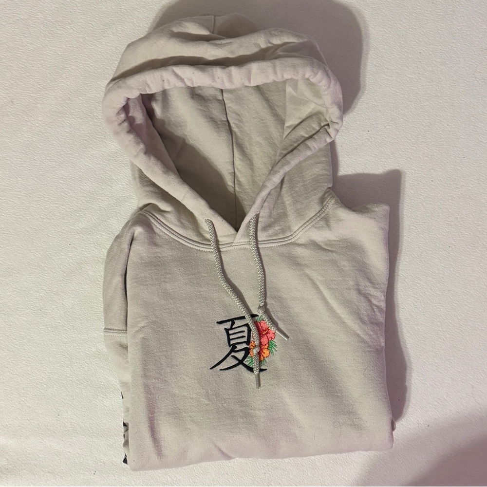 Embroidered Riot Society Hoodie with Floral Design